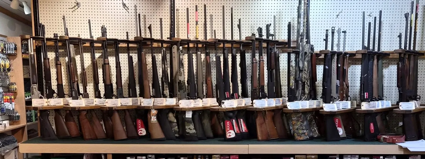 Rifle wall inside Pagosa Guns & Archery in Pagosa Springs, Colorado